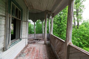 leaning veranda of a wooden house