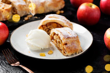 Traditional homemade apple strudel with caramelized apples and raisins.