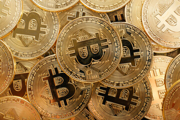Fototapeta na wymiar Close up shot of Bitcoin coins on black background, A pile of Bitcoin Cryptocurrency Gold Bitcoin BTC Bit Coin. Digital blockchain technology, bitcoin mining concept