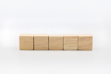 Five blank wooden block cubes on a white background for your text.
