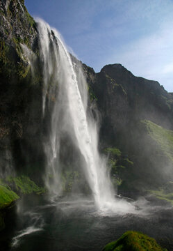 Seljalandsfoss waterfall on the southern coast of Iceland on a sunny day © lensw0rld