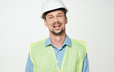 worker in a white helmet engineer safety isolated background