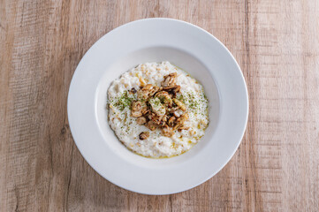 Mushroom risotto in a white bowl
