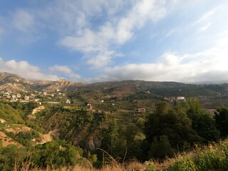 Obraz premium Village and mountain view. Summertime