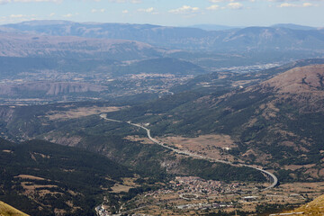 Fototapeta premium panorama of the wide valley of Abruzzo with the highway called A24 near the city of L AQUILA