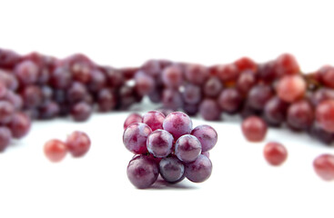Grapes. Purple seedless grapes. Isolated fruit background on a white background.
