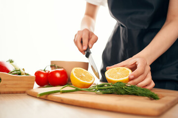 Obraz na płótnie Canvas cooking salad adding ingredients healthy food kitchen