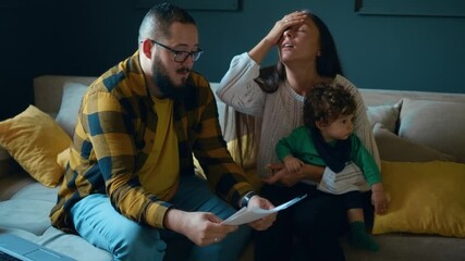 Frustrated married couple feeling stressed about high mortgage. Document loan refusal having financial problems debt. Couple having financial problems