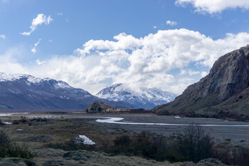 Obraz premium El Chaltén is a small mountain village in Argentina. It is located on the riverside of Rio de las Vueltas.