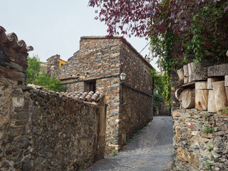 Fototapeta na wymiar Photography of traditional slate houses in the streets of Patones de Arriba, a touristic mountain village in the province of Madrid. Spain. Europe
