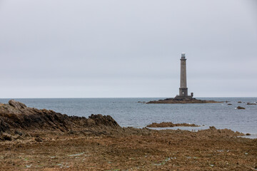 French beach with lighthouse