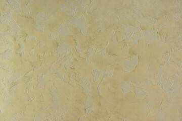 Rough yellow textured background of surface wall pattern