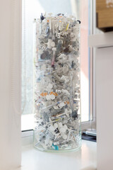 a lot of used syringes on a glass vial in a medical center, beautiful art
