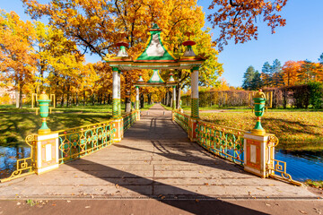 Chinese bridge in autumn foliage in Alexander park, Pushkin (Tsarskoe Selo), Saint Petersburg,...