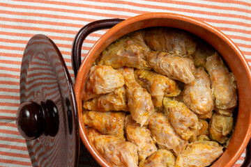 Typical Moldovan and Romanian dish. Cabbage rolls stuffed with meat, rice and vegetables with sour cream. Sarmale.