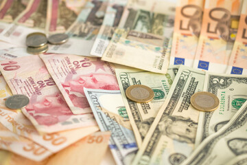 banknotes of Turkish lira, euro, rubles and dollars of different denominations with coins