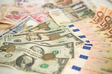 banknotes of Turkish lira, euro, rubles and dollars of different denominations with coins