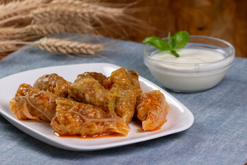 Typical Moldovan and Romanian dish. Cabbage rolls stuffed with meat, rice and vegetables with sour cream. Sarmale.