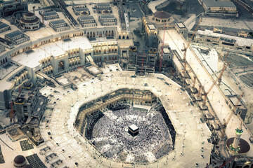 The holy mosque in Makkah city view from the top of Makkah clock tower during sunset. Hajj and...