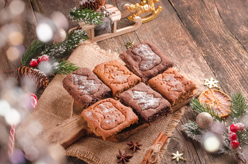 Christmas background, baking gingerbread cookies on wooden background