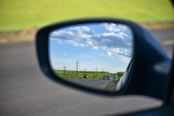 View in the rear-view mirror.