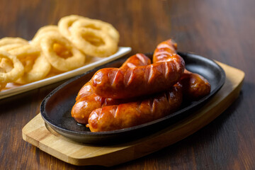 grilled sausage and onion rings