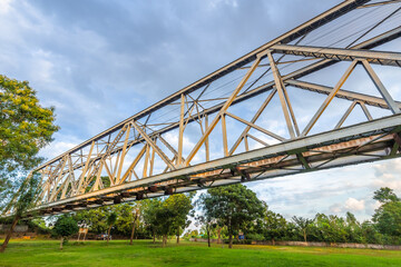 Old railway bridge across the field in countryside at Ban Dara, Pichai District, Uttaradit, Thailand