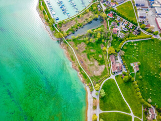 Drone landscape panorama from above Lake Constance Bodensee Seeburgpark Switzerland.