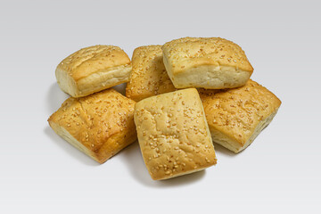 Fresh golden buns with sesame seeds