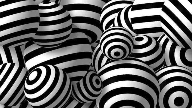Black and white rotating striped balls loopable motion background