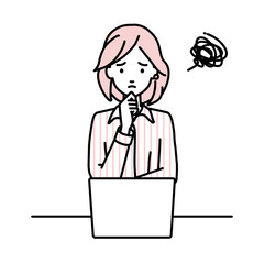 デスクで座ってPCを開いて困っているブラウスの女性