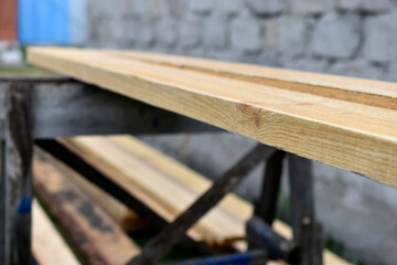 Pine white construction boards at the sawmill