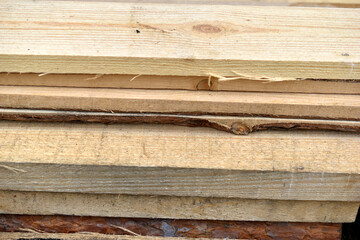 Pine white construction boards at the sawmill