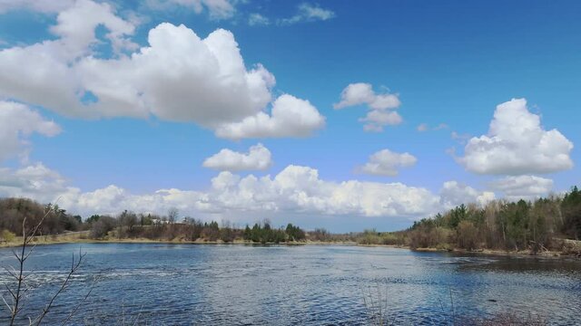a timelapse of clouds over the mississippi river