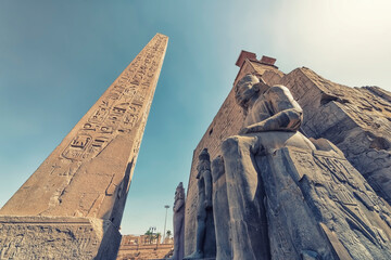 Obelisk and statue in Luxor Temple, Egypt