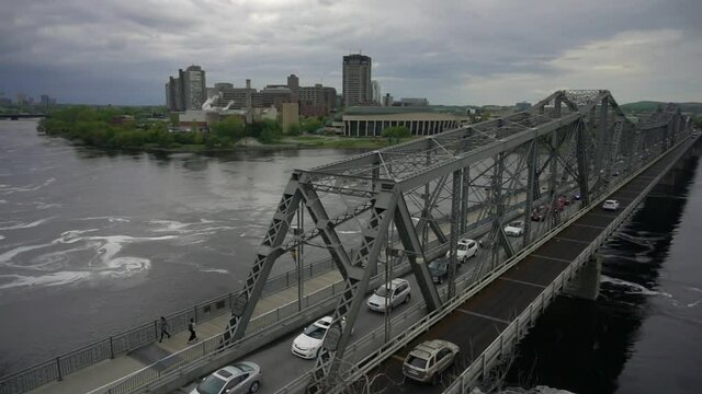 slow moving cars on a bridge