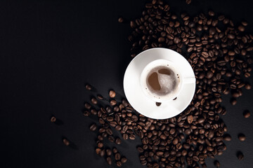 Cup of coffee on dark background