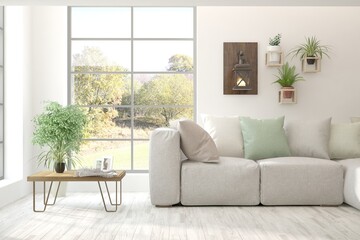 Stylish autumn interior in white color with sofa and  landscape in window. Scandinavian interior design. 3D illustration