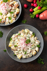 Potato salad with celery, green onion, radish, dill and eggs