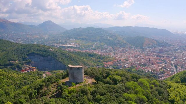 4K aerial - a bird's eye view&nbsp;video (Ultra High Definition) of Bastiglia tower and Arechi Castle. Sunny summer cityscape of Salerno town, Italy, Europe. Traveling concept background.