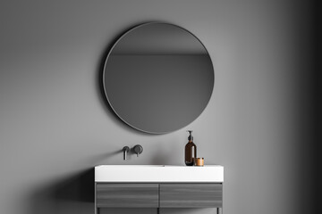 Dark grey bathroom wall with a stylish vanity