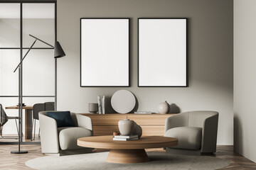 Two canvases in beige living room seating with framed glass wall