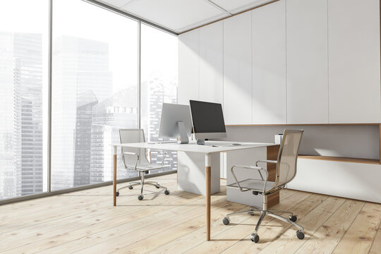 Panoramic white office area with stylish workplace