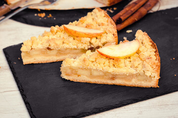 Piece of apple crumble cake, delicious apple pie