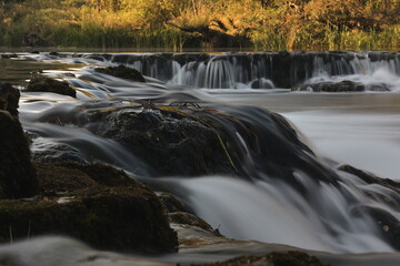 Fototapeta na wymiar Waterfalls on the Dobra River in Croatia