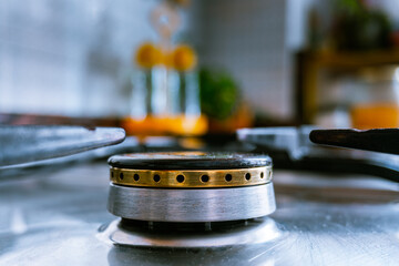 Close-up of the burners of a gas cooker turned off.