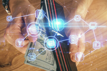 Multi exposure of social network theme drawing hologram and USA dollars bills and man hands.