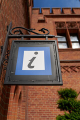 Tourist information sign at the town hall in the old town of Kolobrzeg in Poland
