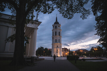 Fototapeta na wymiar VIlnius / Lithuania - August 12 2021: View of the Cathedral and the Old Town of Vilnius in summer, amazing baltic touristic city in Lithuania, Europe