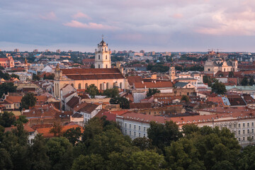 Fototapeta na wymiar VIlnius / Lithuania - August 12 2021: View over the Old Town of Vilnius in summer at sunset, amazing baltic touristic city in Lithuania